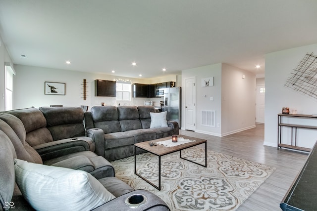 9829 Hulton Rd, Pendleton, IN 46064 - living room with wood finished floors, recessed lighting, and baseboards