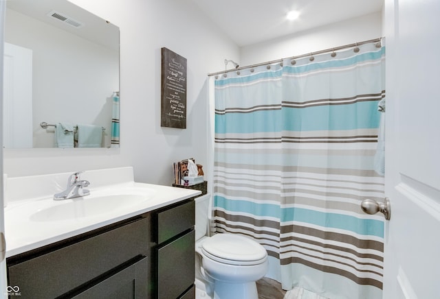 9829 Hulton Rd, Pendleton, IN 46064 - bathroom with toilet, vanity, and curtained shower