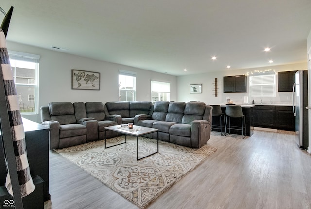 9829 Hulton Rd, Pendleton, IN 46064 - living room featuring light wood-style flooring and recessed lighting