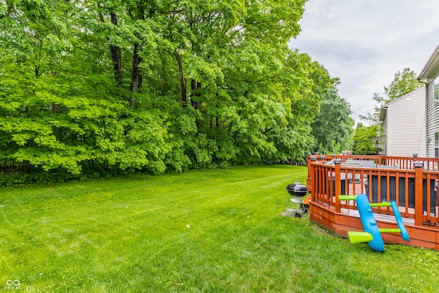 11919 Gatwick View Dr, Fishers, IN 46037 - view of grassy yard with a wooden deck