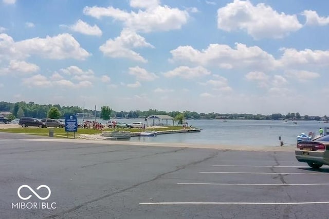 262 Jefferson Vly, Coatesville, IN 46121 - uncovered parking lot featuring a boat ramp and a water view