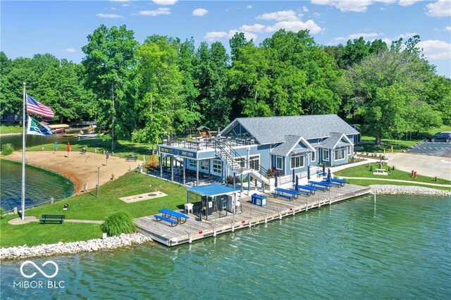 262 Jefferson Vly, Coatesville, IN 46121 - rear view of property with a deck with water view, a lawn, and stairs
