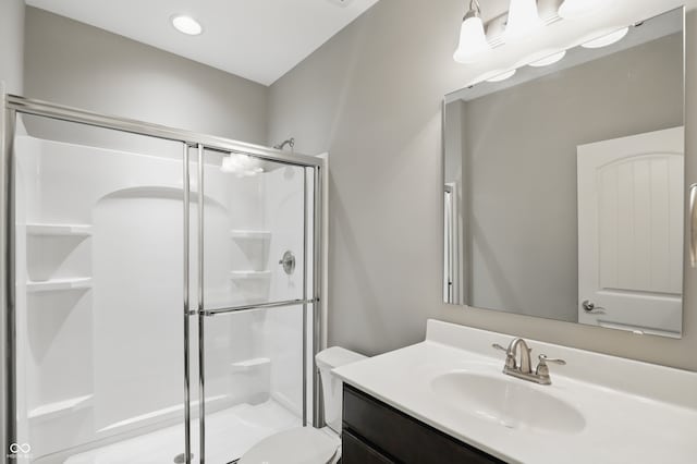 2485 Alexandra Dr, Carmel, IN 46074 - bathroom with a stall shower, vanity, and toilet