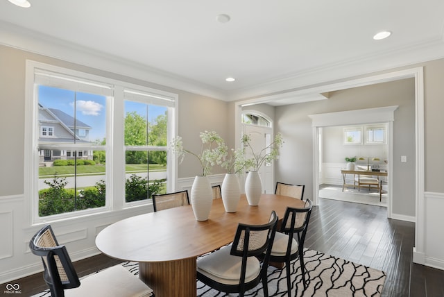 2485 Alexandra Dr, Carmel, IN 46074 - dining area featuring healthy amount of natural light, dark wood-type flooring, ornamental molding, and recessed lighting