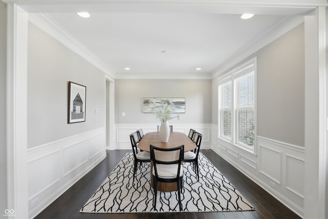2485 Alexandra Dr, Carmel, IN 46074 - dining area featuring dark wood-style floors, recessed lighting, crown molding, and wainscoting