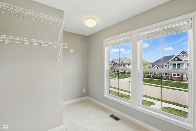 2485 Alexandra Dr, Carmel, IN 46074 - walk in closet with carpet floors