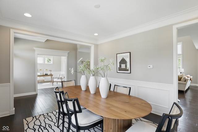 2485 Alexandra Dr, Carmel, IN 46074 - dining room featuring dark wood-style flooring, ornamental molding, and a wainscoted wall