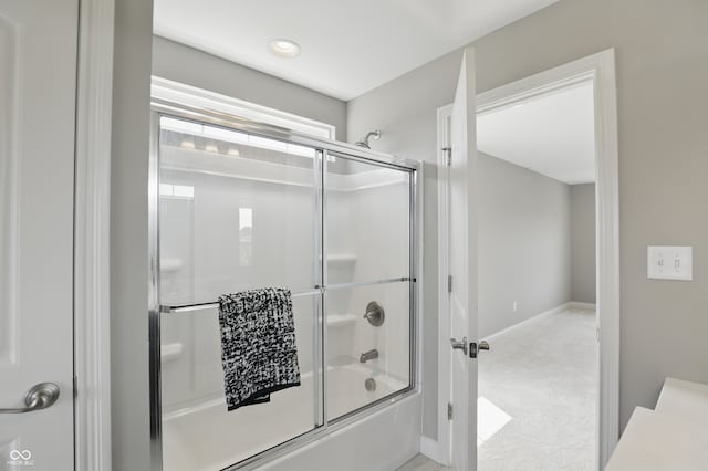 2485 Alexandra Dr, Carmel, IN 46074 - full bath featuring shower / bath combination with glass door and baseboards