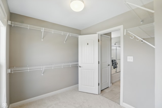 2485 Alexandra Dr, Carmel, IN 46074 - walk in closet with light colored carpet