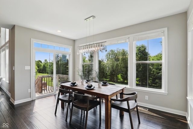 2485 Alexandra Dr, Carmel, IN 46074 - dining room with baseboards, recessed lighting, dark wood finished floors, and a chandelier