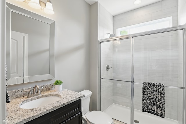 2485 Alexandra Dr, Carmel, IN 46074 - bathroom featuring toilet, vanity, and a stall shower