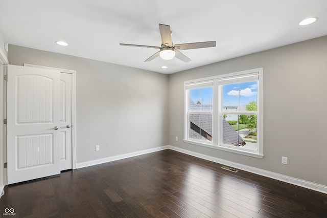 2485 Alexandra Dr, Carmel, IN 46074 - spare room with ceiling fan, baseboards, dark wood finished floors, and recessed lighting