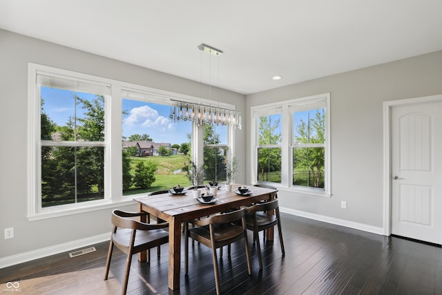 2485 Alexandra Dr, Carmel, IN 46074 - dining space with baseboards, a chandelier, dark wood finished floors, and recessed lighting