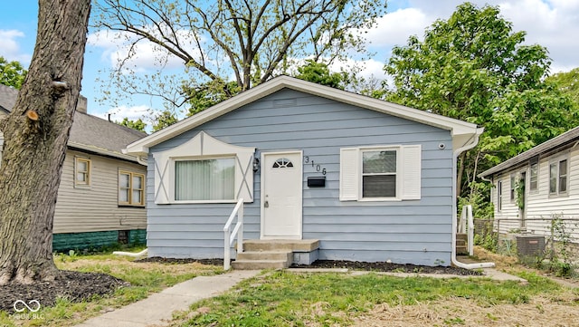 3106 N Harding St, Indianapolis, IN 46208 - bungalow-style home featuring entry steps and central AC unit