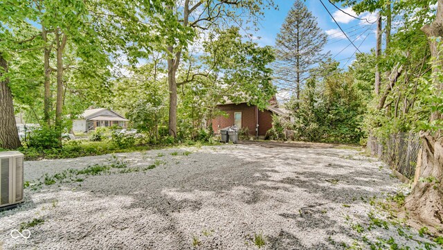 3106 N Harding St, Indianapolis, IN 46208 - view of yard featuring central AC unit
