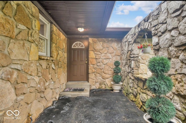 8102 Sycamore Springs Trl, Indianapolis, IN 46239 - doorway to property with stone siding