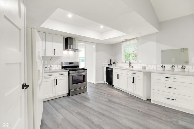 9002 Walton St, Indianapolis, IN 46231 - kitchen with stainless steel range with gas stovetop, wall chimney exhaust hood, a raised ceiling, dishwasher, and a sink