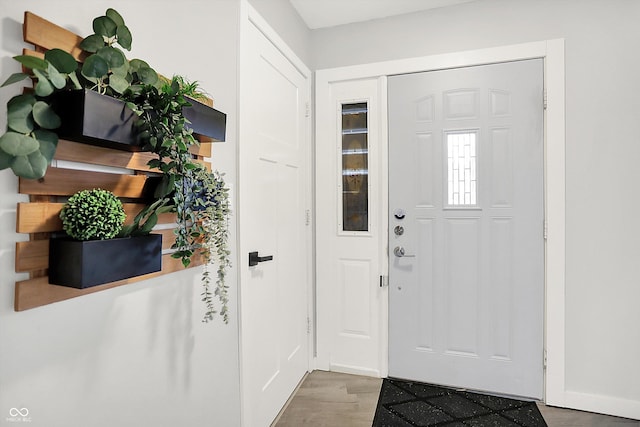 9002 Walton St, Indianapolis, IN 46231 - foyer with wood finished floors and baseboards