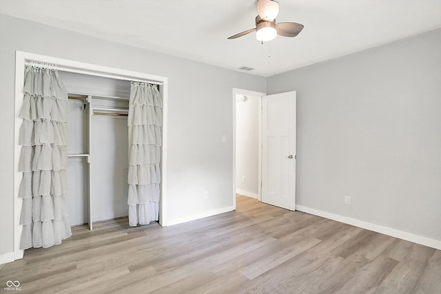 9002 Walton St, Indianapolis, IN 46231 - unfurnished bedroom featuring wood finished floors, a closet, and baseboards