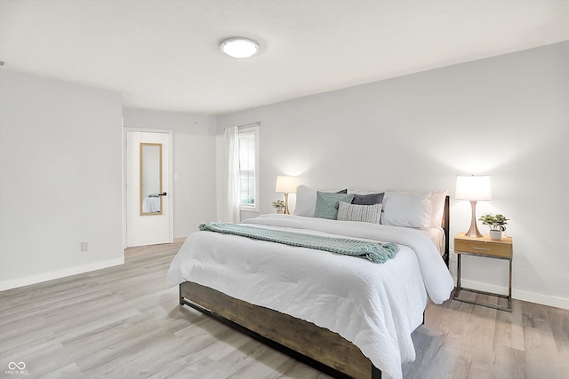 9002 Walton St, Indianapolis, IN 46231 - bedroom with wood finished floors and baseboards