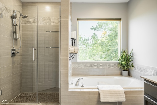 734 Richland Way, Westfield, IN 46074 - full bathroom featuring a stall shower, a garden tub, and vanity