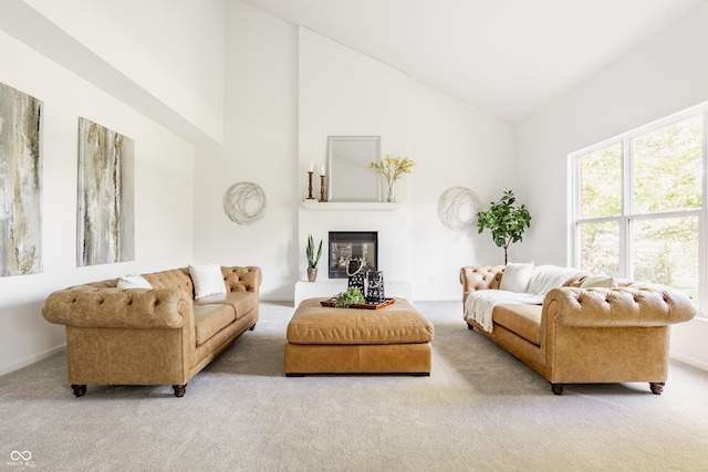 734 Richland Way, Westfield, IN 46074 - carpeted living room with a glass covered fireplace, high vaulted ceiling, and baseboards