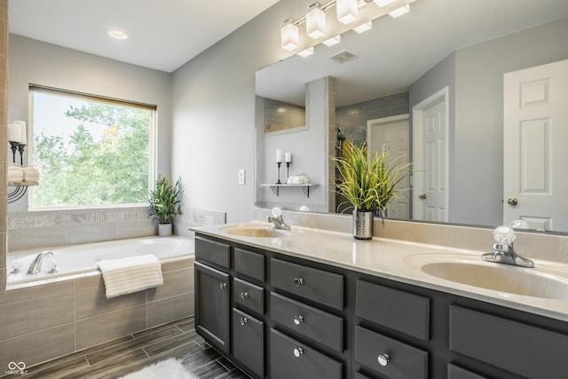 734 Richland Way, Westfield, IN 46074 - full bathroom with double vanity, a bath, and a tile shower