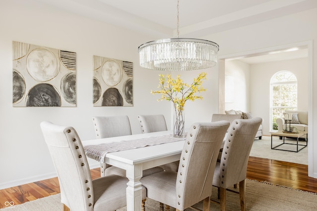 734 Richland Way, Westfield, IN 46074 - dining area featuring a chandelier, wood finished floors, and baseboards