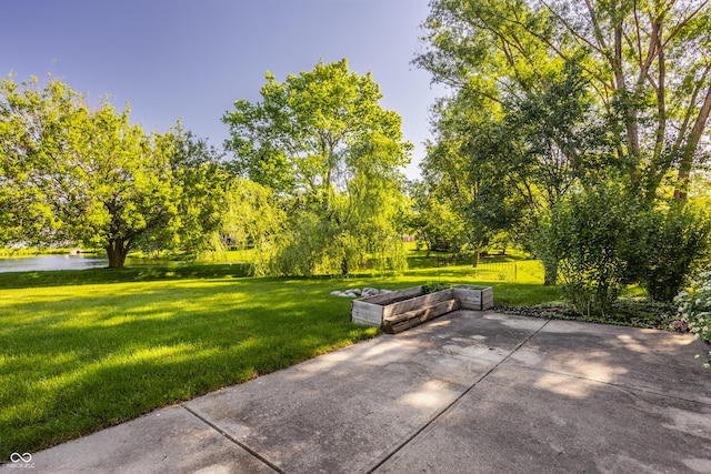 734 Richland Way, Westfield, IN 46074 - view of property's community with a lawn, a water view, and a patio area