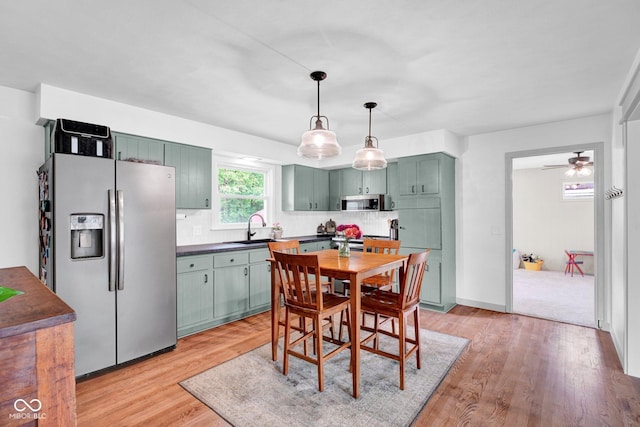 225 E Norris Hts, North Vernon, IN 47265 - dining room featuring light wood-style floors and ceiling fan