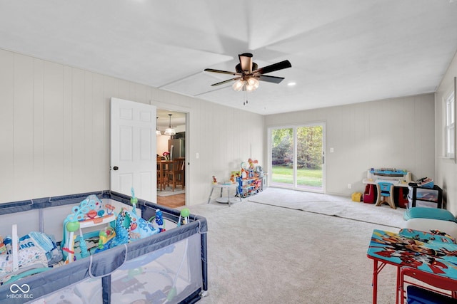 225 E Norris Hts, North Vernon, IN 47265 - bedroom featuring access to exterior, ceiling fan, attic access, and carpet flooring