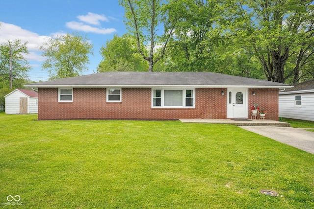 225 E Norris Hts, North Vernon, IN 47265 - single story home featuring brick siding and a front yard