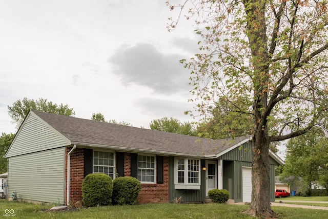 1708 Mason Dixon Dr S, West Lafayette, IN 47906 - ranch-style home featuring an attached garage, brick siding, a front lawn, and roof with shingles