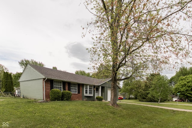 1708 Mason Dixon Dr S, West Lafayette, IN 47906 - ranch-style house with an attached garage, brick siding, and a front yard