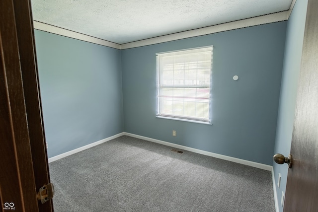 1708 Mason Dixon Dr S, West Lafayette, IN 47906 - spare room featuring carpet, baseboards, and a textured ceiling