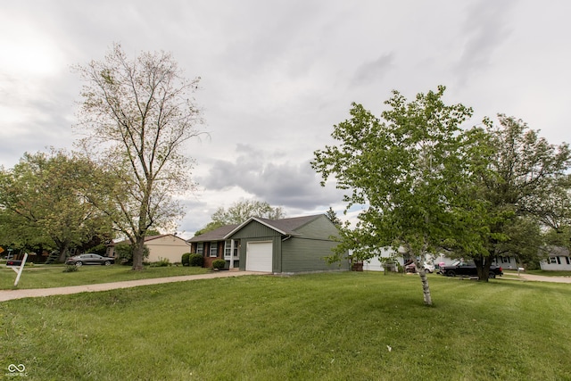 1708 Mason Dixon Dr S, West Lafayette, IN 47906 - ranch-style home with driveway, an attached garage, and a front lawn