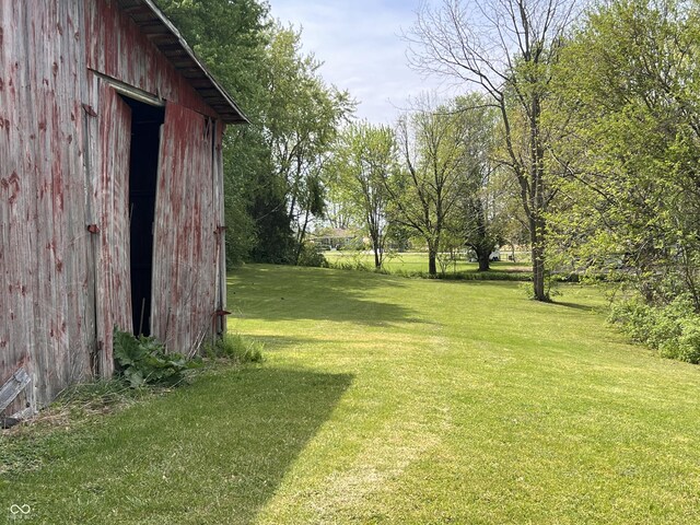 5855 S County Road 800 E, Coatesville, IN 46121 - view of green lawn featuring an outbuilding