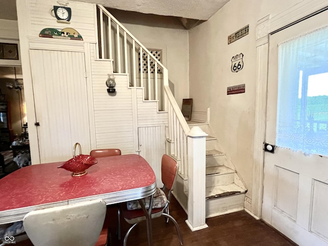 5855 S County Road 800 E, Coatesville, IN 46121 - dining room with stairs, dark wood-type flooring, and baseboards