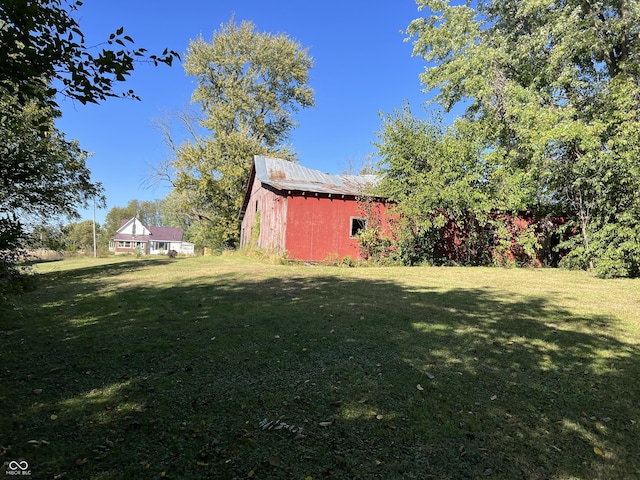 5855 S County Road 800 E, Coatesville, IN 46121 - view of green lawn with an outdoor structure and a barn