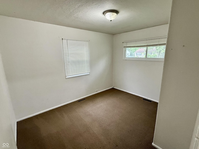 3325 Canaday Dr, Anderson, IN 46013 - empty room featuring carpet flooring and baseboards