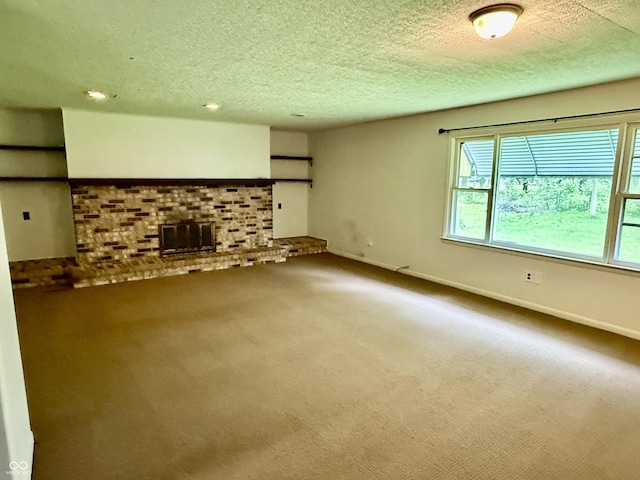 3325 Canaday Dr, Anderson, IN 46013 - unfurnished living room featuring carpet, a fireplace, a textured ceiling, and baseboards