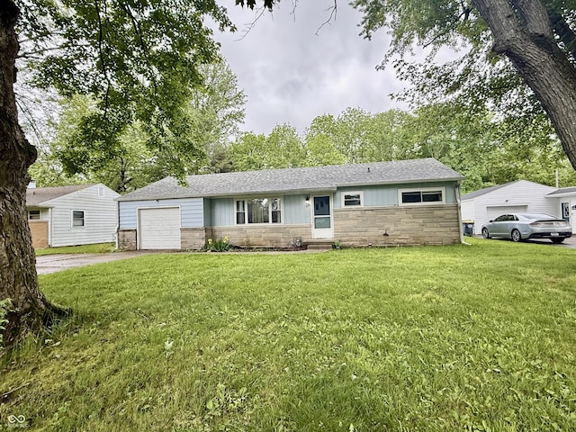 3325 Canaday Dr, Anderson, IN 46013 - ranch-style home featuring stone siding, driveway, a front yard, and a shingled roof