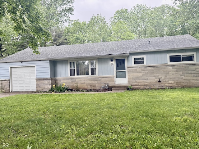 3325 Canaday Dr, Anderson, IN 46013 - ranch-style house with stone siding, a shingled roof, a garage, and a front yard