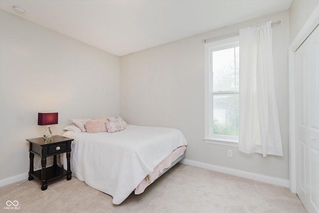 6337 Ederline Ln, Noblesville, IN 46062 - bedroom featuring light carpet, multiple windows, and baseboards