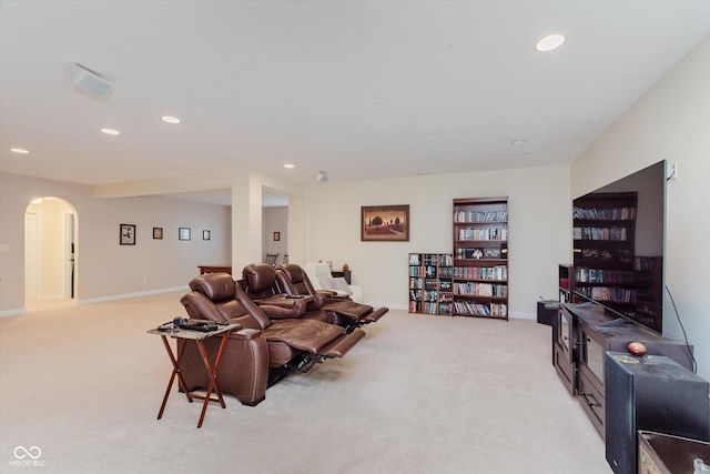 6337 Ederline Ln, Noblesville, IN 46062 - living area featuring light colored carpet, arched walkways, recessed lighting, and baseboards
