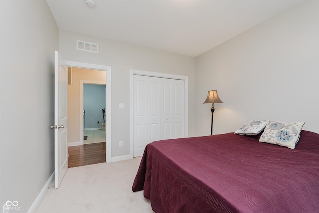 6337 Ederline Ln, Noblesville, IN 46062 - bedroom with light colored carpet, a closet, and baseboards