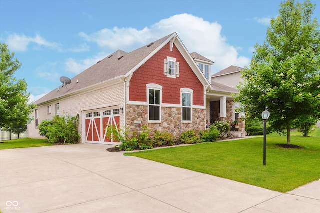 6337 Ederline Ln, Noblesville, IN 46062 - view of front of property featuring concrete driveway, stone siding, a front yard, a garage, and a shingled roof