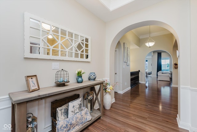6337 Ederline Ln, Noblesville, IN 46062 - corridor with arched walkways, wood finished floors, crown molding, and baseboards