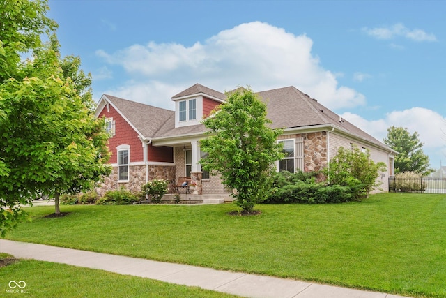 6337 Ederline Ln, Noblesville, IN 46062 - view of front of property with stone siding, covered porch, and a shingled roof