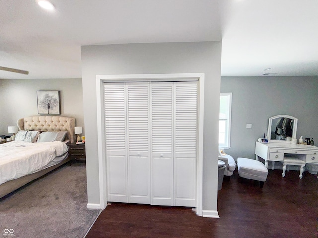 201 N Tacoma Ave, Indianapolis, IN 46201 - bedroom with a closet, baseboards, and wood finished floors
